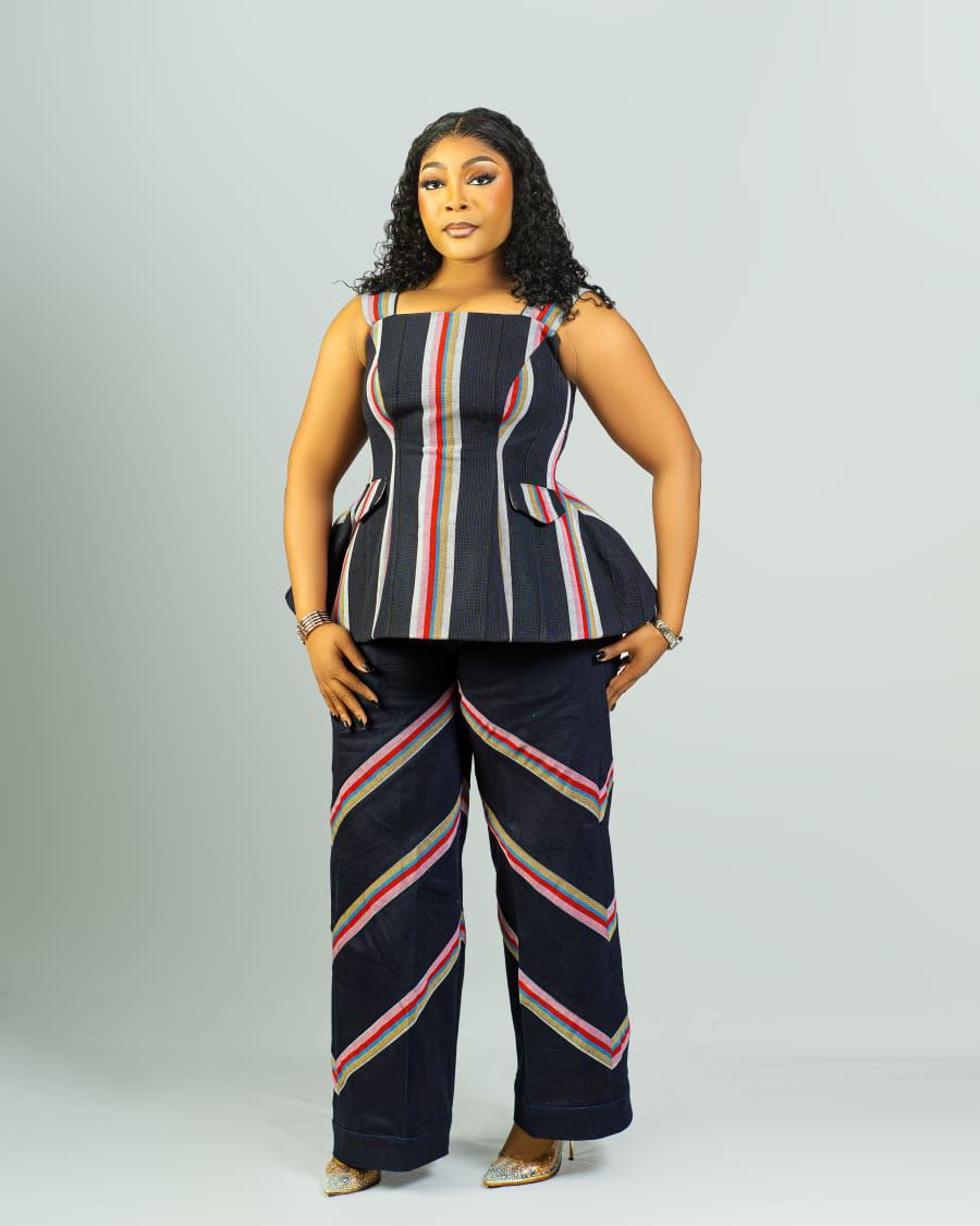 what is aso oke showing a picture of aso oke peplum and jean trousers made by ahdookeh fashion